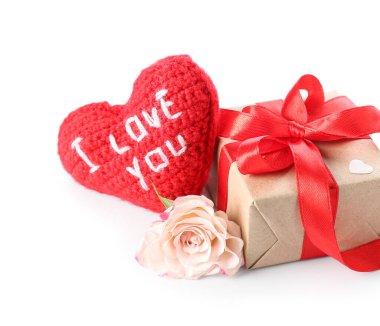 Gift box with toy and rose for Valentine's Day on white background