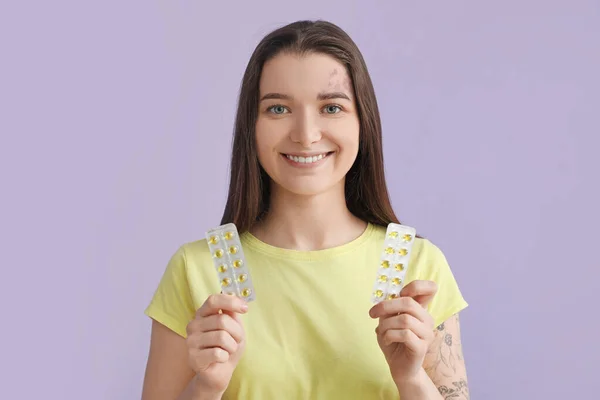 Young Woman Blisters Vitamin Supplements Lilac Background — Stock Photo, Image
