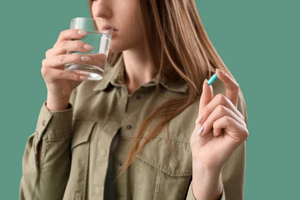 Beautiful Woman Vitamin Supplement Drinking Water Green Background Closeup — Stock Photo, Image
