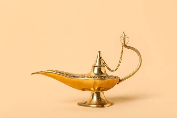 Aladdin lamp of wishes for Ramadan on beige background