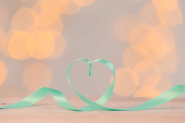 Heart Made Green Ribbon Table Blurred Lights Valentine Day Celebration — Stockfoto