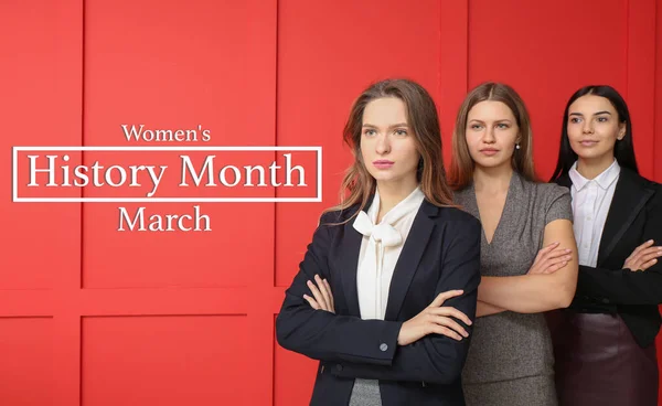 Beautiful young businesswomen on red background. Women\'s History Month