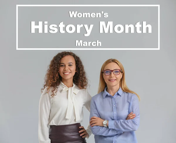 Beautiful businesswomen on grey background. Women\'s History Month