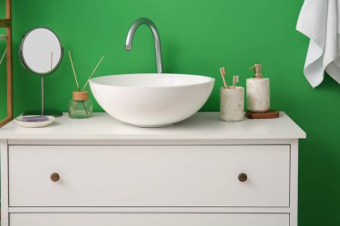 Modern sink in interior of stylish bathroom, closeup
