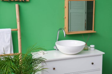 Modern sink in interior of stylish bathroom, closeup