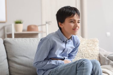 Little boy with appendicitis at home