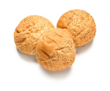 Delicious buns with sesame seeds isolated on white background