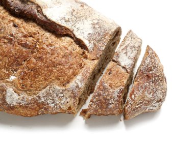 Loaf of sliced rye bread isolated on white background