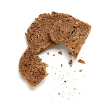 Pieces and crumbs of rye bread isolated on white background