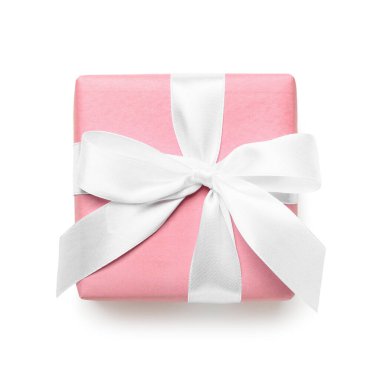 Gift box wrapped in pink paper on white background