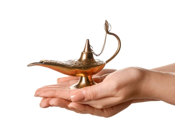 Woman with Aladdin lamp of wishes for Ramadan on white background