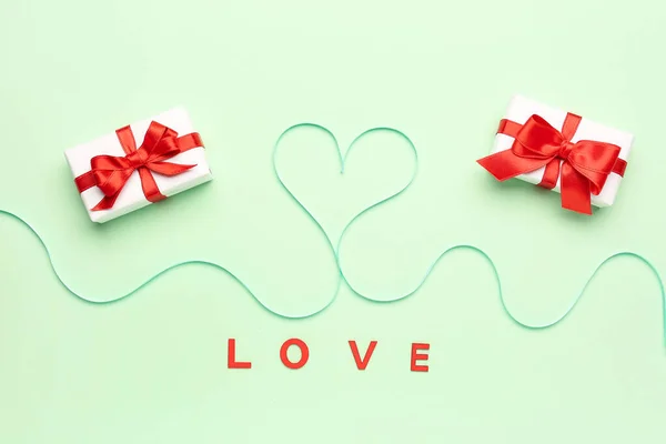 Heart Made Turquoise Satin Ribbon Gifts Green Background Valentine Day — Φωτογραφία Αρχείου