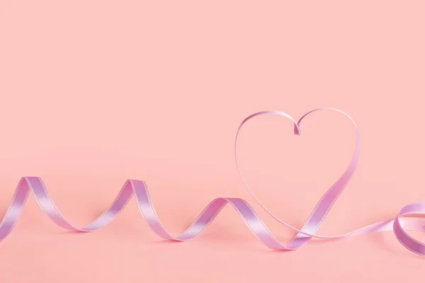Heart Made Lilac Satin Ribbon Pink Background Valentine Day Celebration — стокове фото
