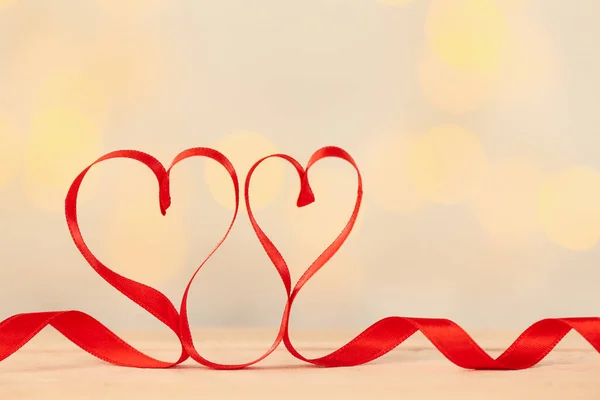 Hearts Made Red Ribbon Table Blurred Lights Valentine Day Celebration — стокове фото