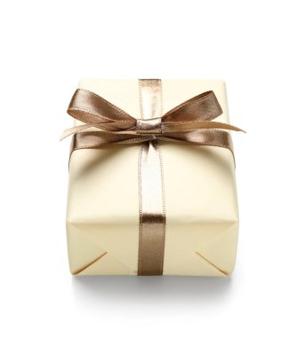Gift box tied with silk ribbon on white background
