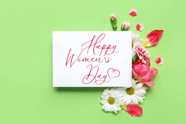 Greeting card for International Women\'s Day and flowers on green background