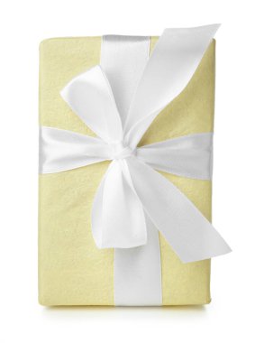 Gift box with bow on white background. International Women's Day celebration