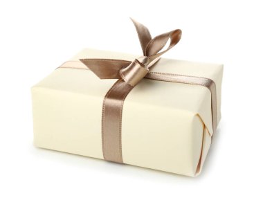 Gift box with bow on white background. International Women's Day celebration