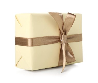 Gift box with bow on white background. International Women's Day celebration