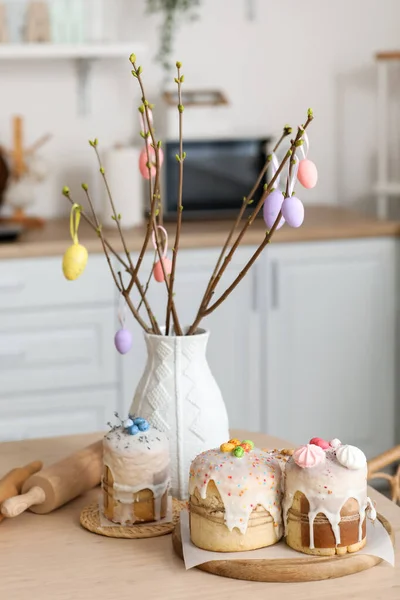 Vase Tree Branches Tasty Easter Cakes Dining Table Kitchen — стоковое фото
