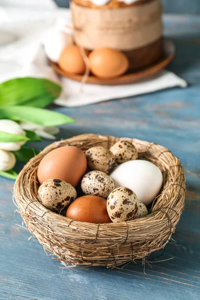 Nest Easter Eggs Blue Wooden Table — Fotografia de Stock