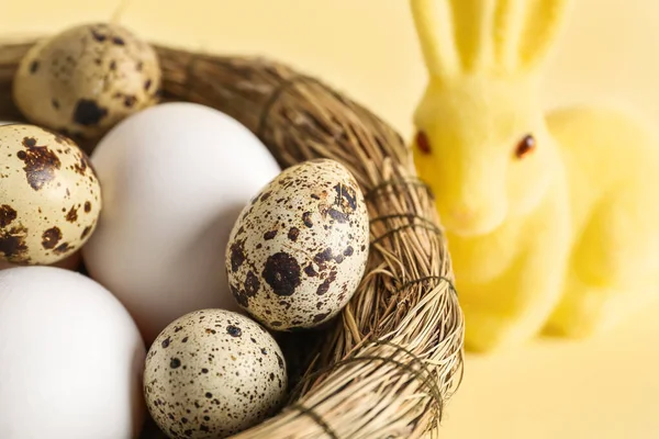 Nest Easter Eggs Bunny Yellow Background Closeup — Fotografia de Stock