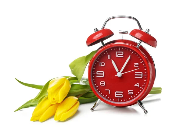 Alarm Clock Yellow Tulip Flowers White Background — стоковое фото