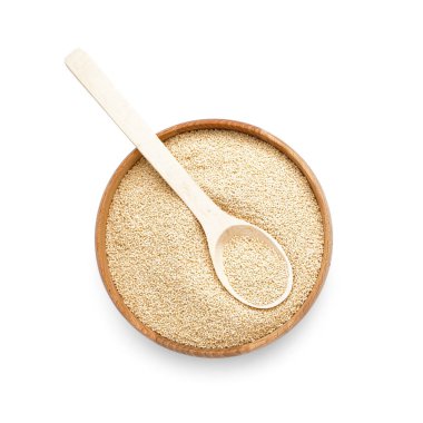 Wooden bowl of amaranth seeds on white background