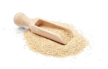 Wooden scoop of amaranth seeds on white background