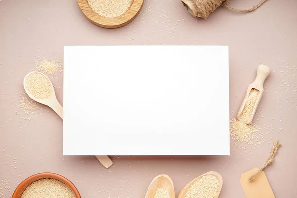 stock image Composition with blank card and amaranth seeds on color background