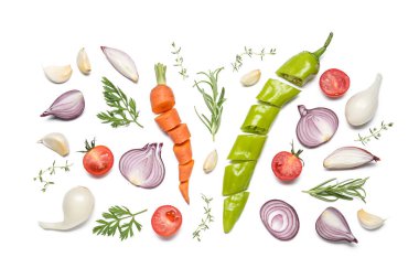 Composition with different vegetables and herbs isolated on white background