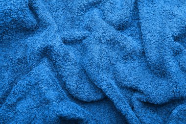 Texture of blue fluffy fabric as background