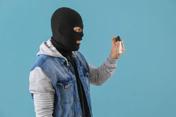 Thief Pepper Spray Self Defence Blue Background — Stock Photo, Image