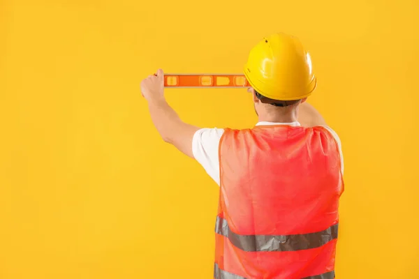 Male Worker Builder Level Yellow Background — Photo