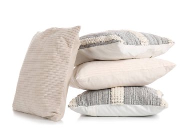 Stack of decorative pillows on white background