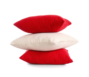 Stack of stylish pillows on white background