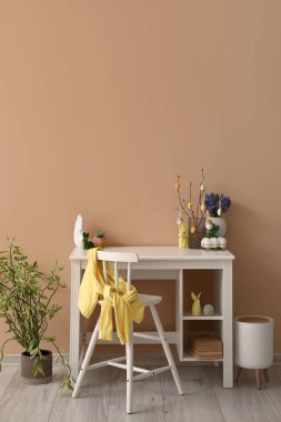 Interior of office with workplace and Easter decor