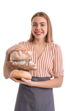 Female baker with fresh bread on white background