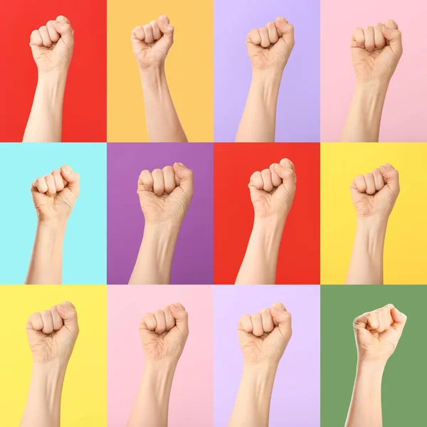 Set of female clenched fists on color background. International Women\'s Day