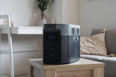 Portable power station on table in living room