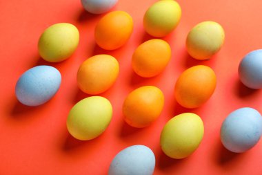 Colorful Easter eggs on color background, closeup