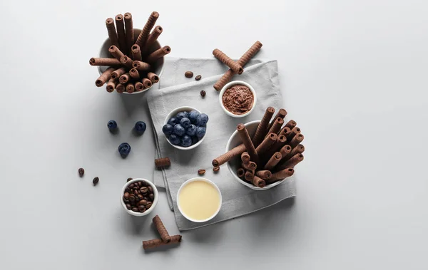 Composition Delicious Chocolate Wafer Rolls Blueberries Condensed Milk Coffee Beans — Stock Photo, Image