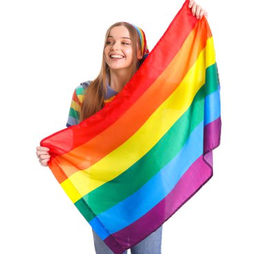 Beautiful young woman with LGBT flag on white background