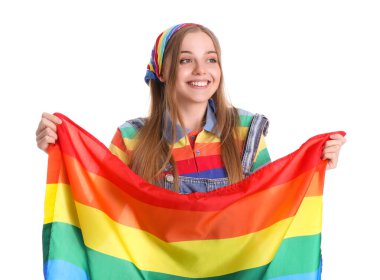 Beautiful young woman with LGBT flag on white background