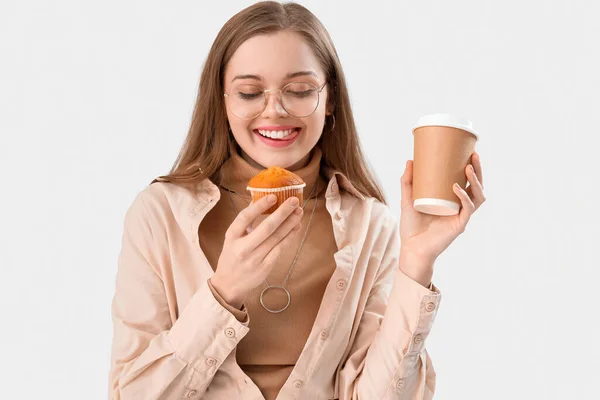 Young Woman Tasty Cupcake Cup Coffee Light Background Closeup — Stock Photo, Image