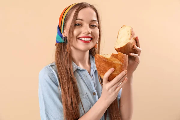 Young Woman Fresh Bread Beige Background Closeup — Stock Photo, Image