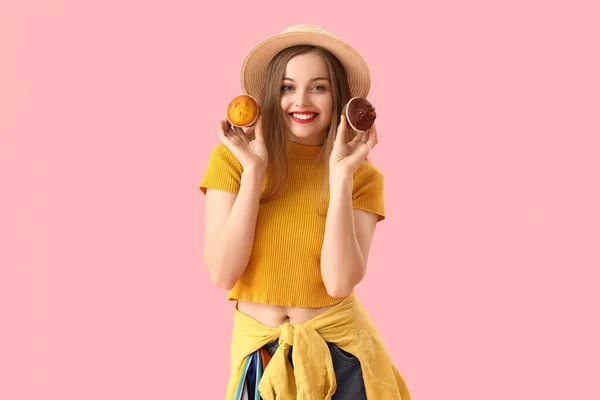 Young Woman Hat Tasty Muffins Pink Background — Stock fotografie