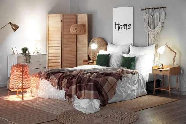 Interior Bedroom Brown Checkered Blankets Bed Glowing Lamps Late Evening — Stock Photo, Image