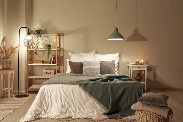 Interior Bedroom Green Blankets Bed Burning Candles Glowing Lamps Late — Stock Photo, Image