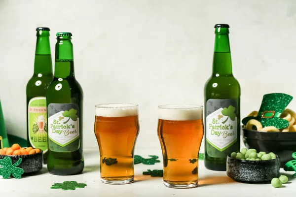 Glasses Bottles Beer Snacks Paper Clovers Light Background Patrick Day — Foto Stock